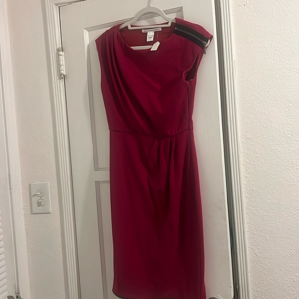 Diane Von Furstenberg Maroon/Dark Link dress with zipper on shoulder . Size 4